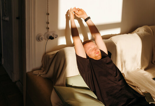 Relaxed modern man at home.