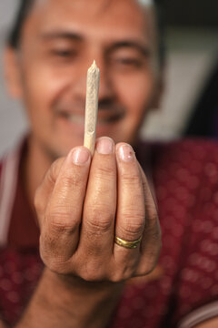Man holding a joint