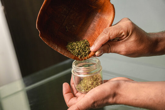 Man packing weed