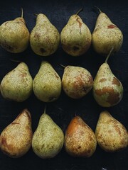 pears on black background