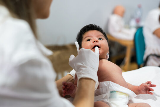 Healthcare Team Caring for a Child in Hospital