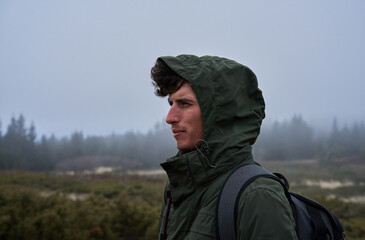 Portrait of a man in the mountain in winter