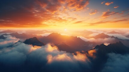 Beautiful golden sunset above cloud with sun shinning on horizon and mountain. - obrazy, fototapety, plakaty