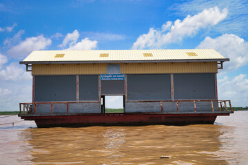 Floating Market on Tonle Sap Lake - Largest fresh water lake in Cambodia at Siem Reap, Cambodia,...