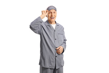 Elderly man in pajamas with a sleeping mask