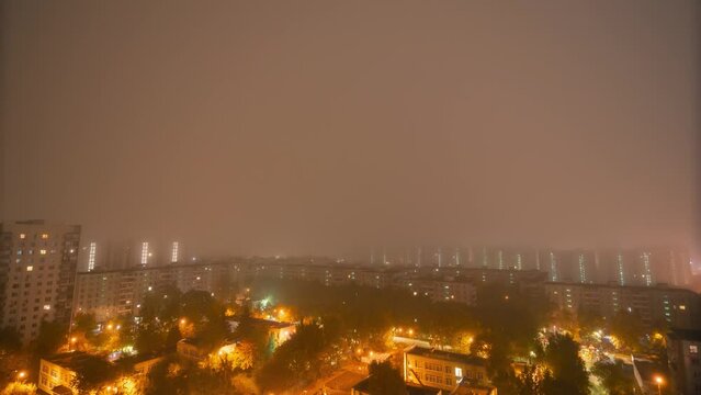 Timelapse of fog in night and morning city