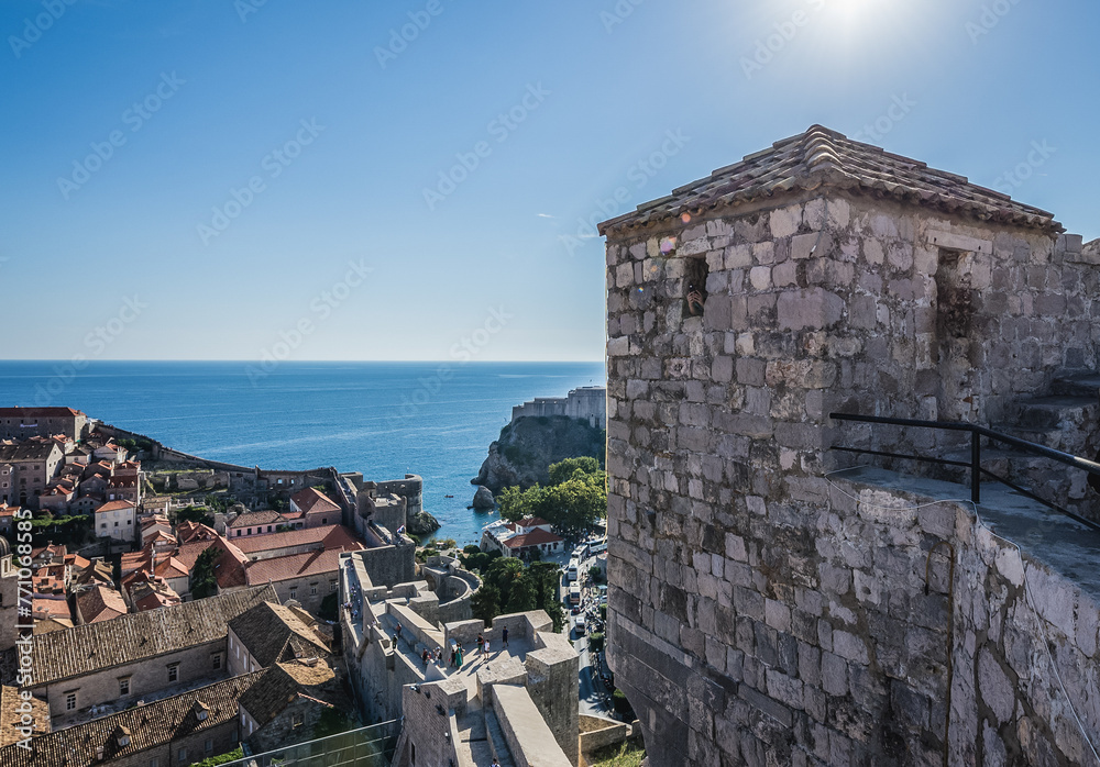 Wall mural Tourists on walls in Old Town of Dubrovnik city, Croatia