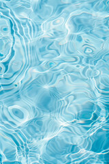Abstract rippling water texture in cool tones - 771073185