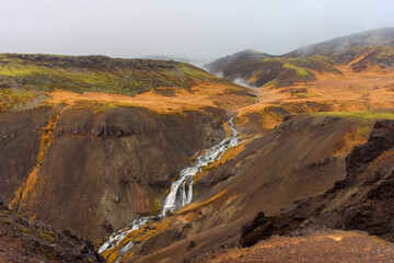 Volcanic landscape of Reykjadalur, steamy valley with natural hot springs,  Iceland