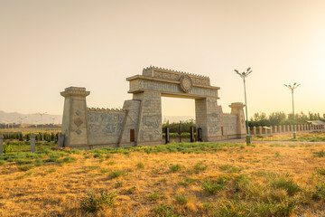 Fototapeta na wymiar Gate of Sarazm at sunset, archeological UNESCO site in Tajikistan