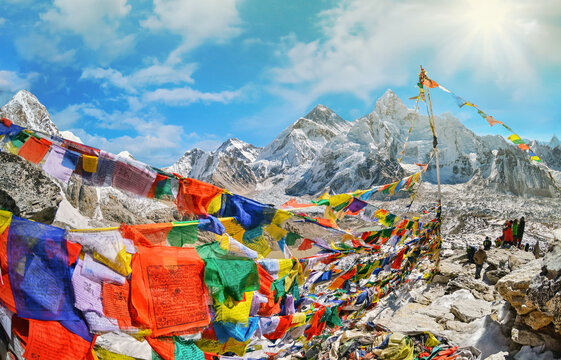 View of Mount Everest and Nuptse  with buddhist prayer flags from kala patthar in Sagarmatha National Park in the Nepal Himalaya