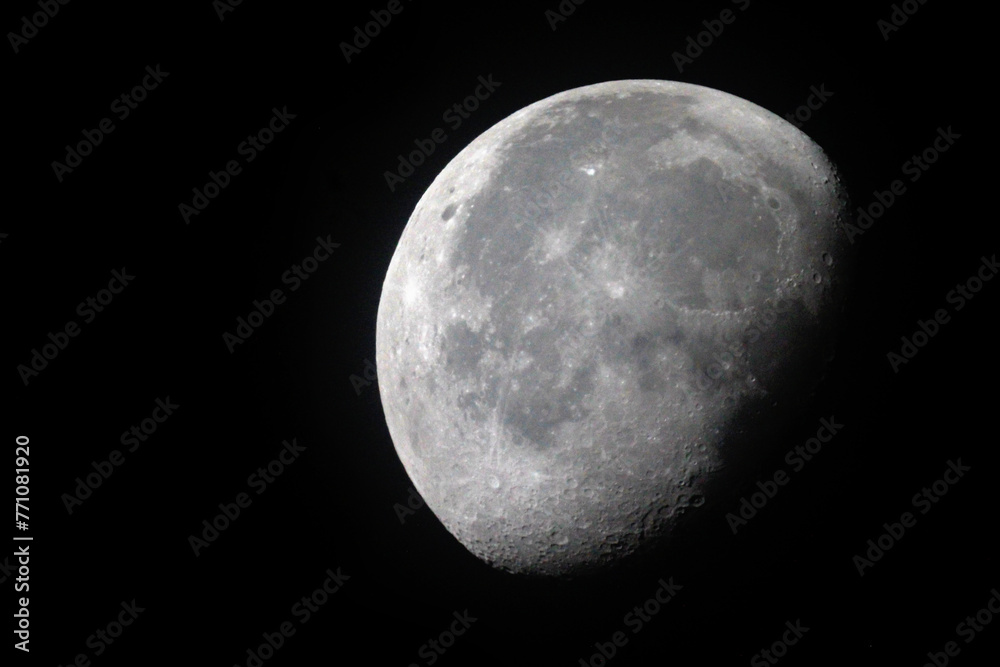 Wall mural the moon is 19 days old and is in the waning gibbous phase of its lunar cycle. it is 83% illuminated