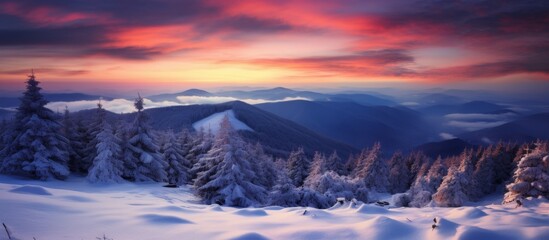 Fototapeta na wymiar The atmosphere is painted in hues of orange and pink as the sun sets behind the snowy forest. A beautiful natural landscape with snowcovered trees and mountains in the background
