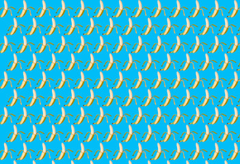 a seamless pattern of bananas on a blue background