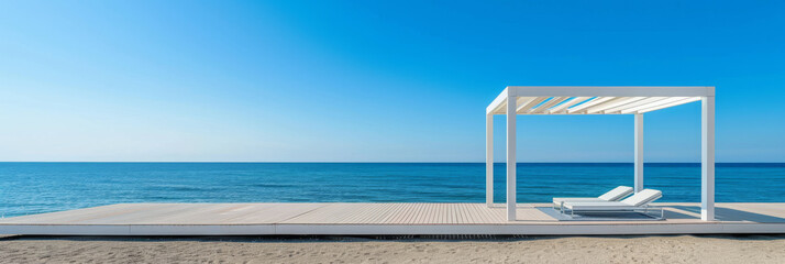 Serene beach scene with modern white cabana overlooking the tranquil blue ocean under clear skies