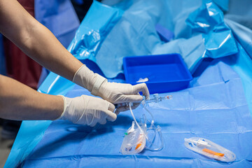 The procedure of inserting a double lumen catheter into a patient with cardiovascular occlusion in...