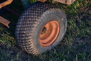 Fototapeta na wymiar Tire and Rusty Wheel