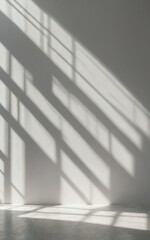 Obraz premium Authentic and understated soft-focus natural light through windows, casting shadows on textured wallpaper, creating an abstract backdrop. Simplistic abstract white light background ideal for product 