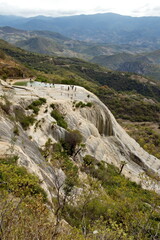 Pool on a plateau at the top of a tavertine waterfall rock formation at Hierve el Agua in Oaxaca, Mexico