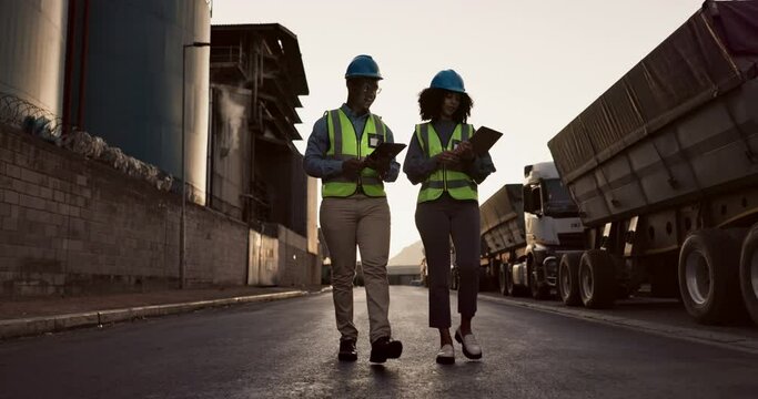Man, woman and tablet for shipping with truck, inspection and clipboard in street for industrial logistics. People, teamwork and checklist by freight lorry in company parking lot for supply chain job