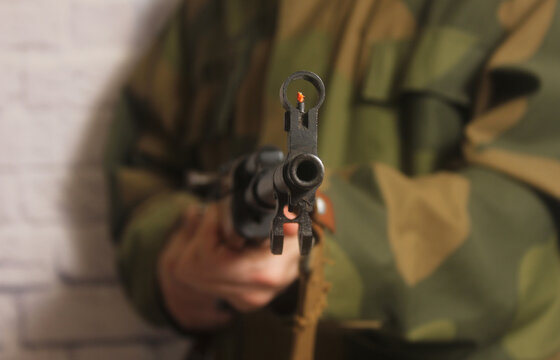 Man Holding SKS 7.62 x 39mm Military Weapon