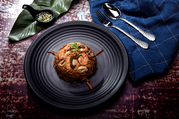 Spicy fried rice with seafood.One of feverite thai food served with Sliced chilli in fish...