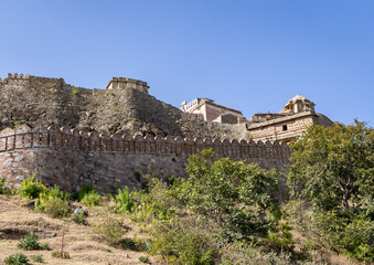 Fototapeta na wymiar ancient fort wall ruins with bright blue sky at morning