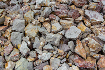 Background of stone pebbles. Texture of stone pebbles. Abstract background and texture for design. Gravel ground texture background, close up of gravel in the garden
