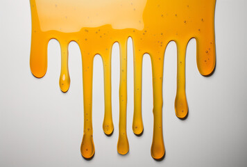 dripping honey isolated on white background, Honey drop  isolated on white background. Pouring sweet honey swirl,  closeup. Maple syrup isolated on white background, Flow of sweet honey. 