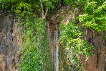 Obraz premium Pha Rom Yen Waterfall at Ban Rai, Uthai Thani, Thailand