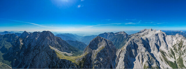Grintovec and Storžič  mountains in Slovenia - Aerial view above the beautiful mountains and...