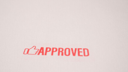 3 photo of red approved stamp inscription on white paper