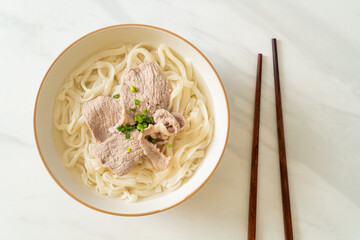 udon noodles with pork in clear soup