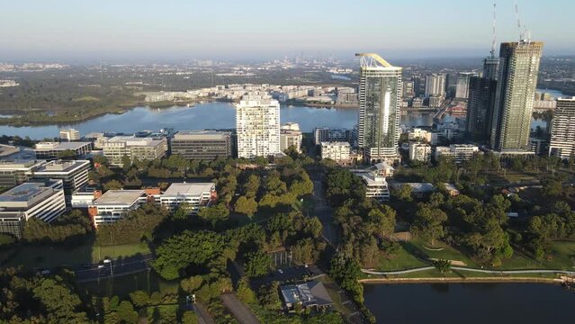 Aerial drone view of Rhodes, an Inner West suburb of Sydney, and Homebush Bay, NSW Australia on a sunny morning in March 2024 