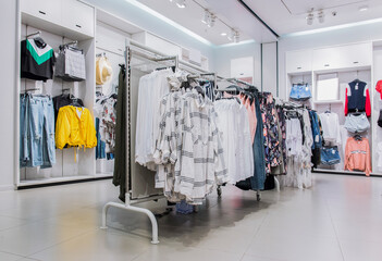 Various shop clothing in ladies' clothing store in summer	
