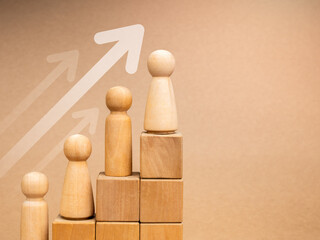 Population growth, leadership with business success concept.  Wooden figures female and male...