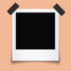 Polaroid with tape on peach background vector editable