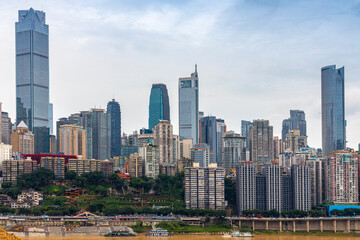 The city center of Chongqing, China is densely populated with high-rise buildings, which are very...