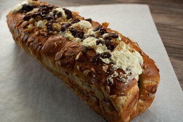 A closeup view of a butter cream stuffed loaf.
