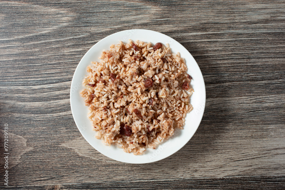 Wall mural a top down view of a plate of rice and peas.