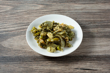 A view of a plate of callaloo and saltfish.