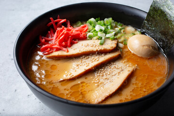A closeup view of a bowl of miso ramen.