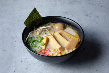 A view of a bowl of veggie ramen.
