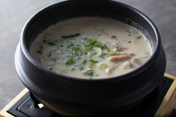 A view of a bowl of tom kha gai.