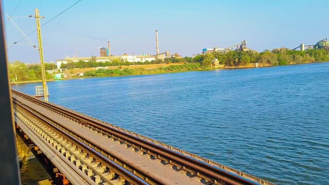 The great south indian village sceneries, while traveling in train.	