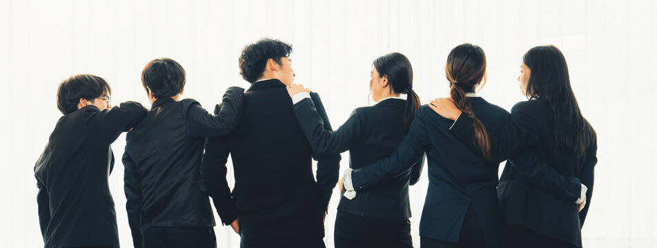 Panoramic banner back view of office worker team standing in line together with friendship posture symbolize successful professional teamwork and job employment, HR agency recruitment concept. Shrewd