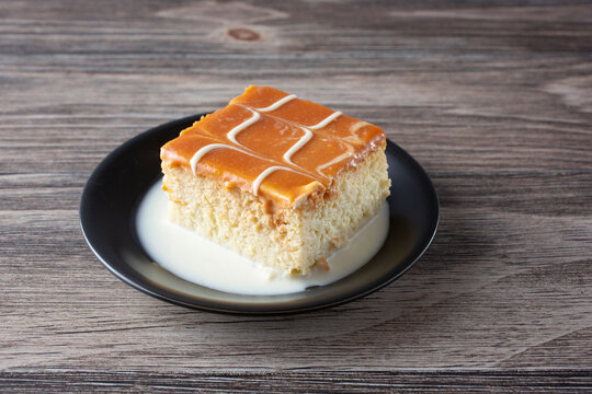 A view of a plate of caramel milk cake.
