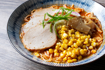 A view of a bowl of spicy miso ramen soup.