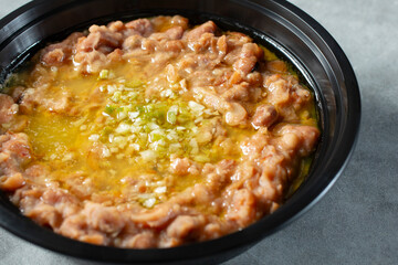 A closeup view of a bowl of ful medames.