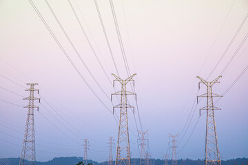 The high-voltage electric tower appears very majestic and spectacular in the sky